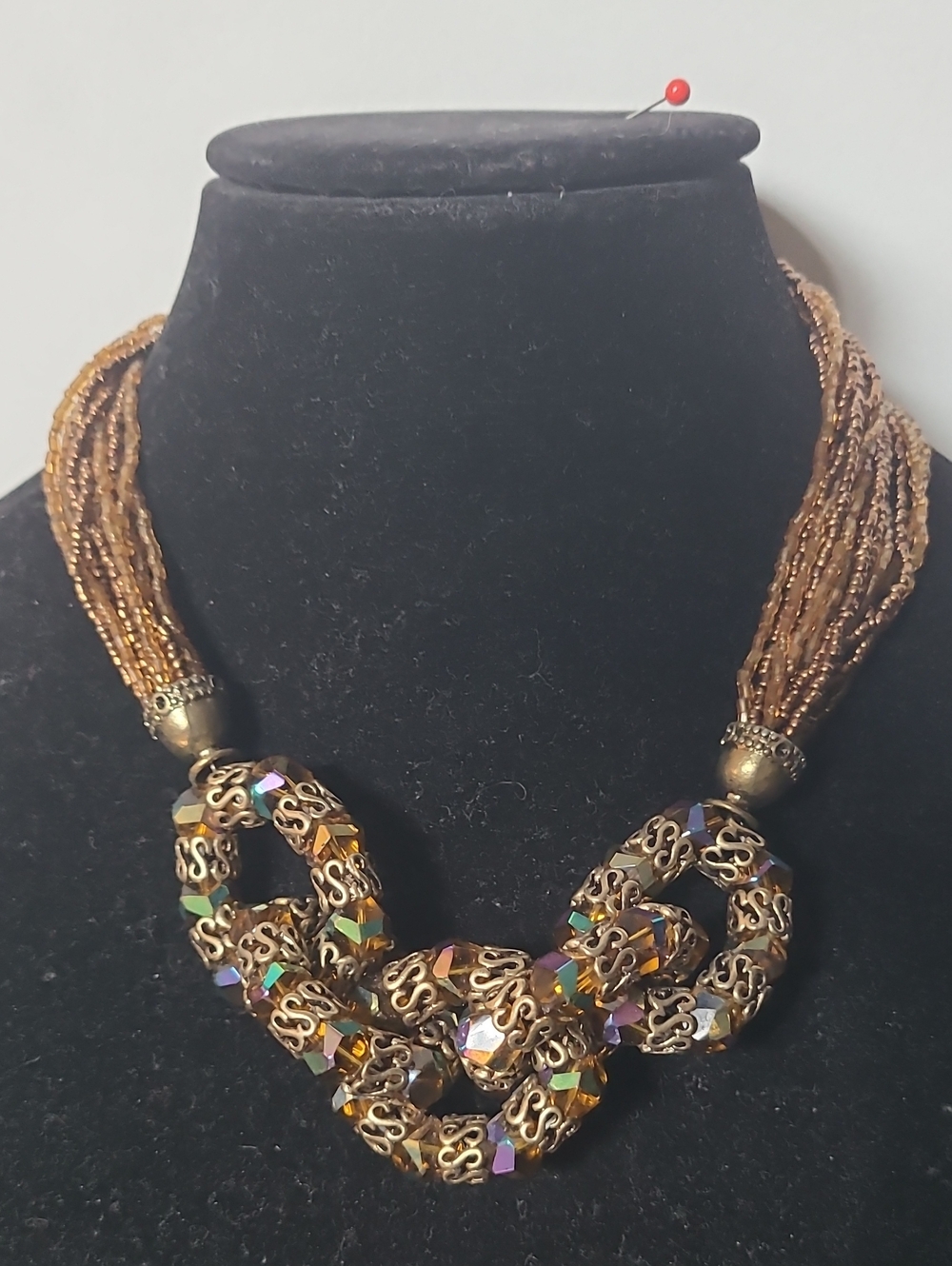 Gold-Tone Multistrand Beaded Statement Necklace with Decorative Rings